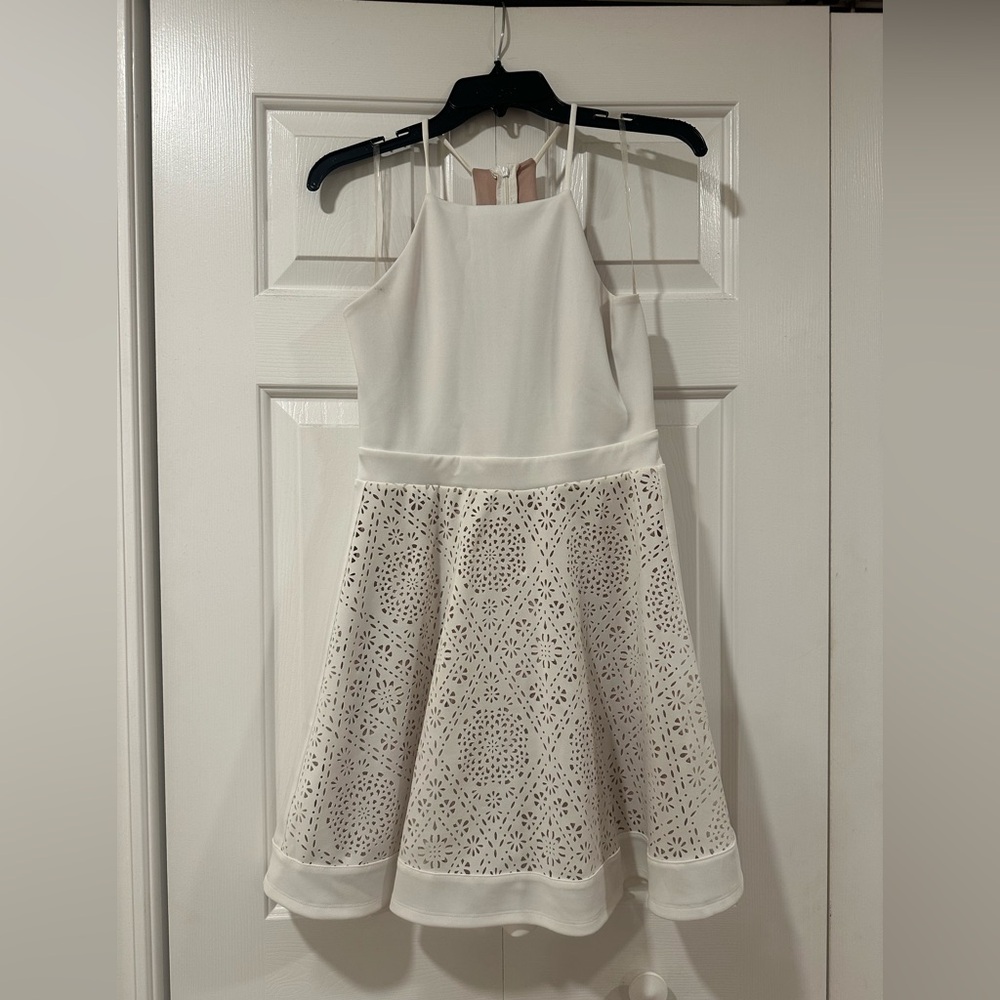 Francesca’s White Laser Cut High Neck Skater Dress